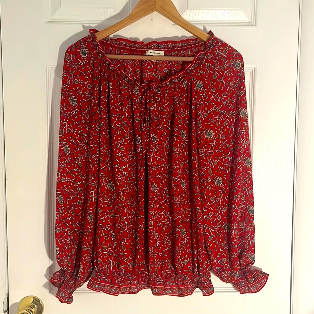 Floral swing top with tie front and elastic ruffle sleeves and hem